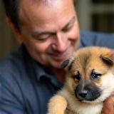 Ben Patel with mixed-breed puppy